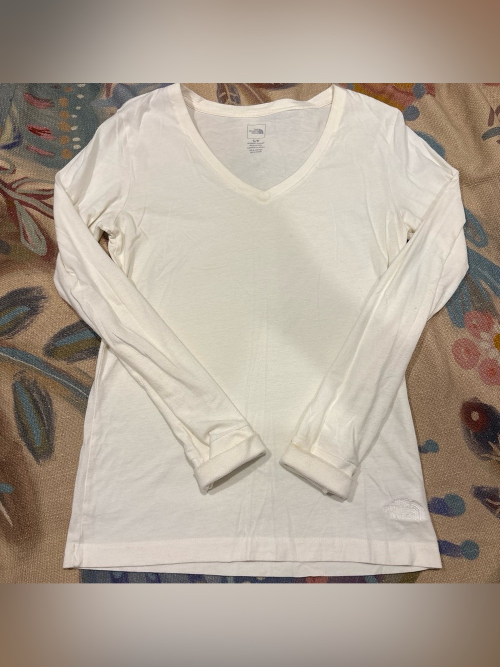The North Face Women’s White Long-Sleeve V-Neck Tee